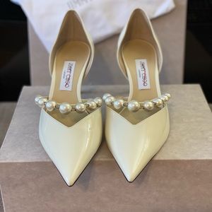 Jimmy Choo
Aurelie 65MM Patent Leather D'Orsay Pumps